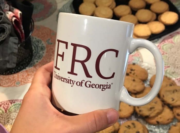 Photo of FRC mug at a cookie night