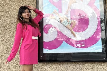 Picture of Prisha Rathore posing next to the Barbie Movie Poster